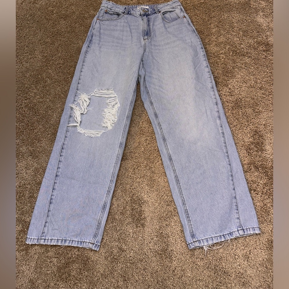 Garage Ample/Baggy Distressed wide leg jeans.